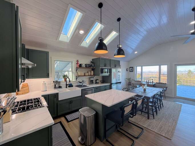 Enjoy the beautiful open concept kitchen with expansive view of the mountains