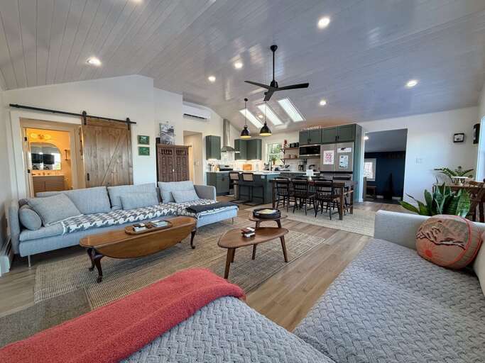 Modern open concept kitchen, living area and dining room with great views