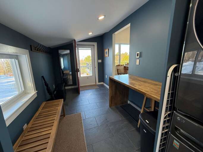Spacious entryway with washer and dryer