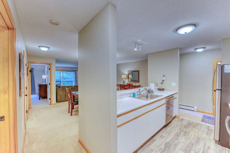 Kitchen offers stainless steel appliances and a breakfast bar for 4.