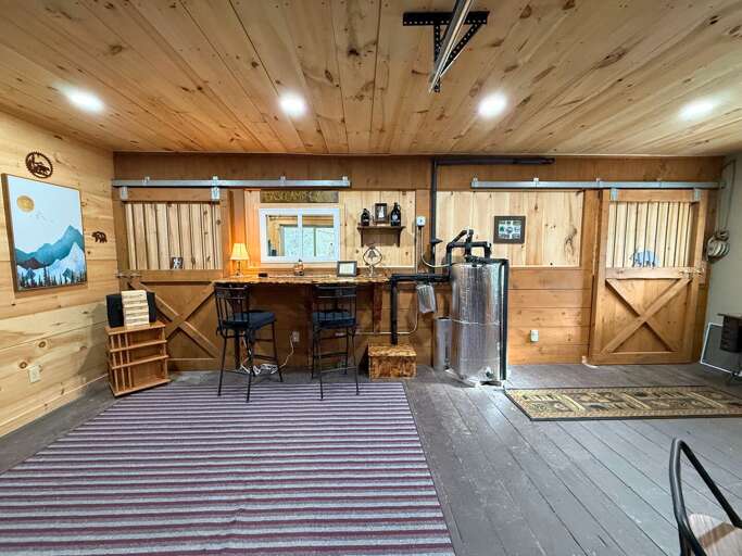 3-season living area and gear room. Opens up to the outdoors in summer.