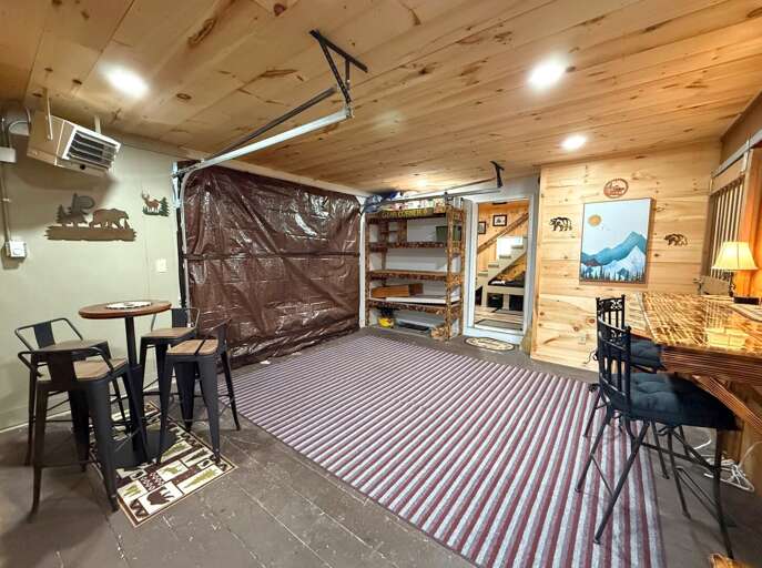 3-season living area and gear room. Opens up to the outdoors in summer.