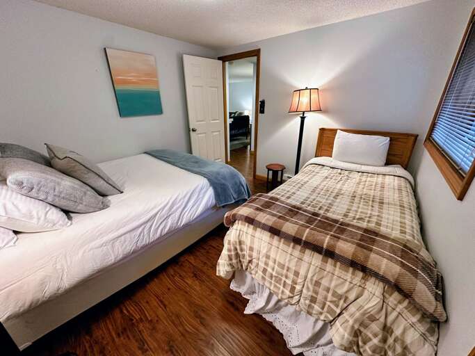 Lower level bedroom with Full and Twin bed