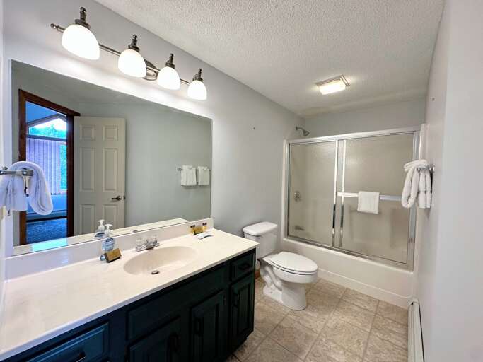 Upper level King bedroom ensuite bath with shower/tub combo