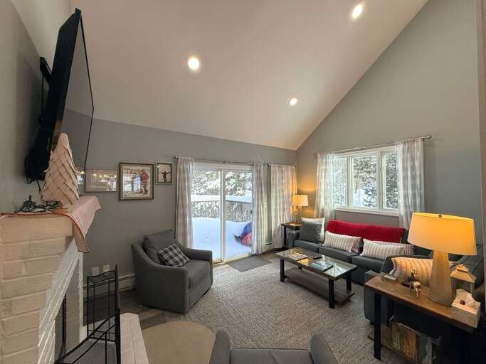 The Main Level Living Area is adjacent to the dining area and kitchen. It offers comfortable