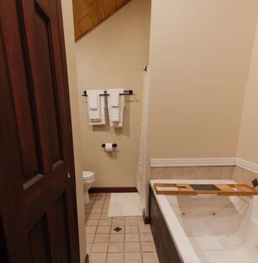 Bathroom with soaking jetted tub