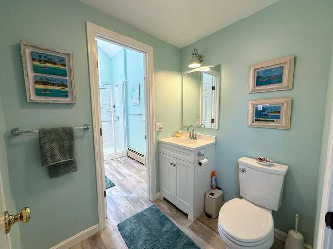 The Upper Level Bathroom is separated into two rooms - one with vanity and shower and the other with a vanity and toilet for easy sharing between the two upper level bedrooms.