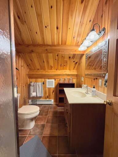 Upper Level Shared Bathroom with Shower