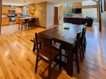 Enjoy home cooked meals with the convenience of a large dining table