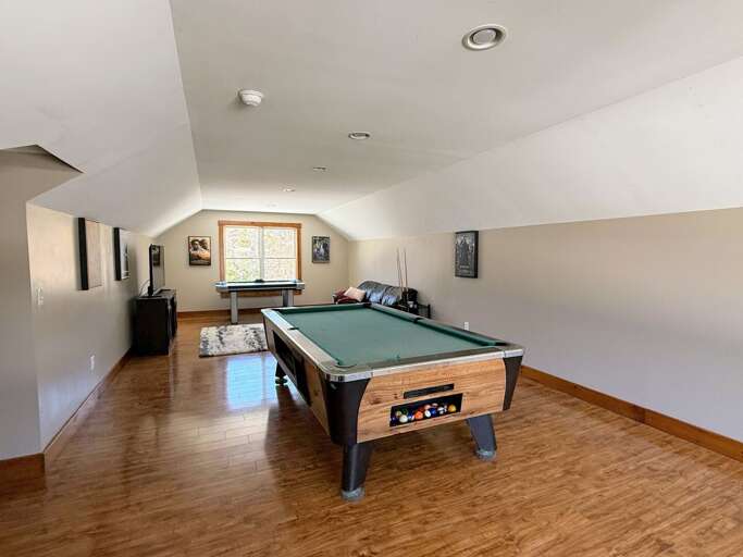 Loft area with TV, Pool Table, Air Hockey Table and exercise bike