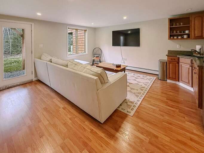 Additional living area in the lower level with kitchenette