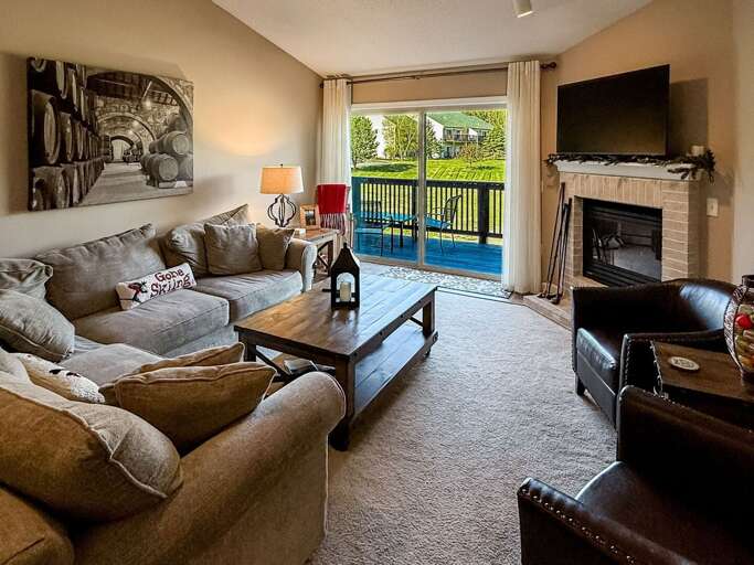 View of the living area. Cozy sectional!