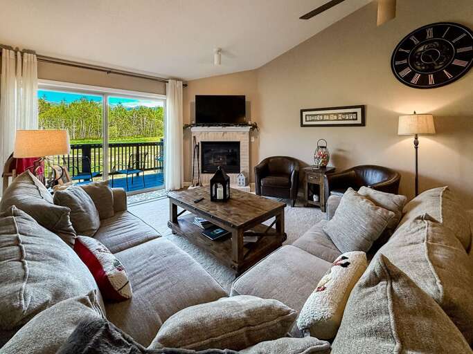 View of the living area. Cozy sectional!