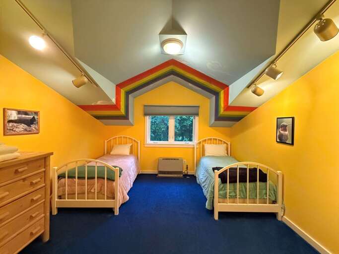 Upper Level "yellow" room with 2 twin beds