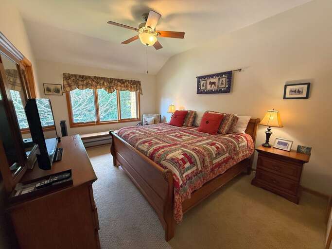 Upper level king bedroom with smart TV, large closet and ensuite bath.