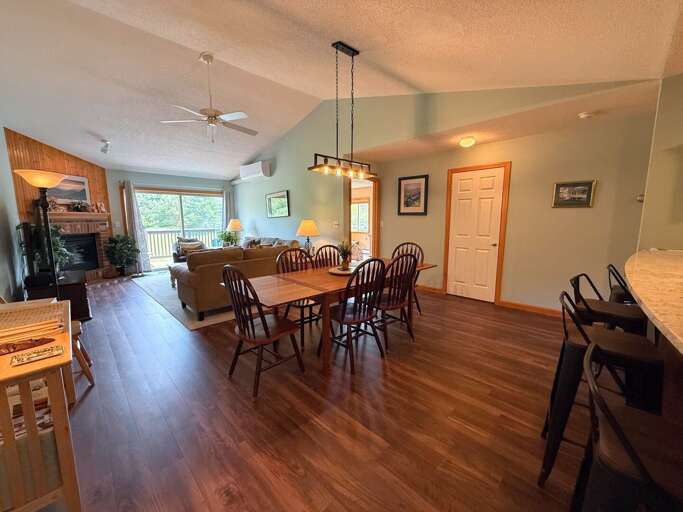 Dining area and breakfast bar leading to the living area.
