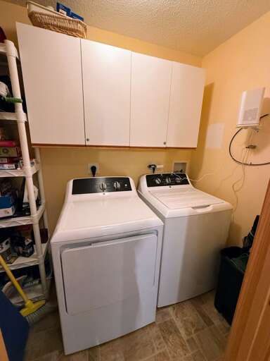 Laundry facilities adjacent to dining area.
