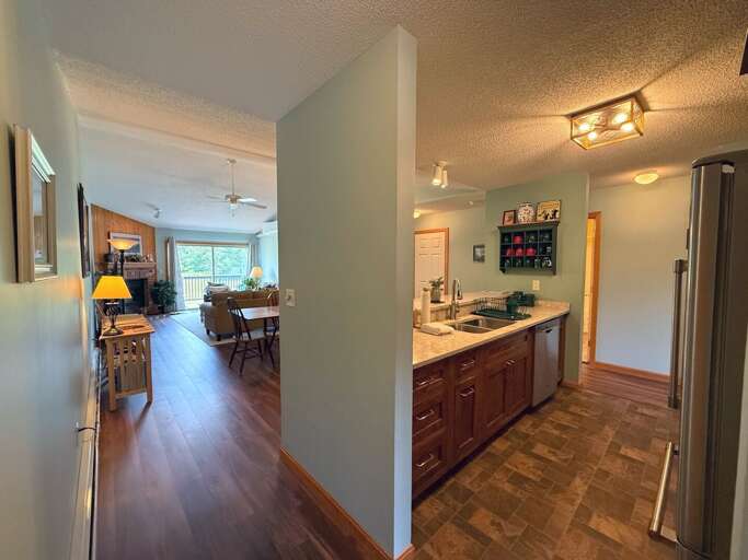 Open concept kitchen dining and living areas.