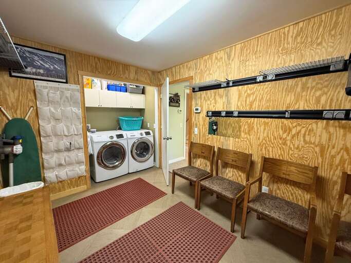 Lower level interior ski area and laundry room.