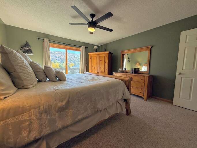 King Bedroom with Ensuite Bath, Walkout Slider, and TV
