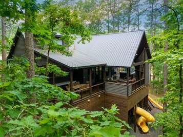 Enjoy the 1,200 sq foot covered deck while the kids play below. No Rain outs because we got you covered. 