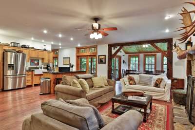 Bear Foot Lodge blends modern style with rustic charm. The open concept main level includes a chef's