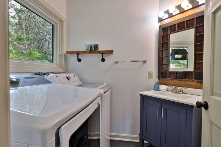 Full-size washer and dryer with forest views. Pack lighter and head home with clean gear, not a suitcase full of laundry.