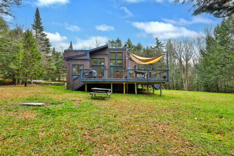 Massive backyard and deck with fire pit. Perfect for evening s'mores and letting the kids burn off that last bit of energy.