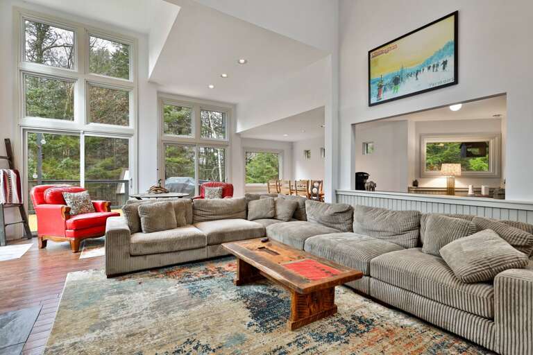 Massive corduroy sectional and vaulted ceilings. Plenty of space for everyone to stretch out after a day on the slopes.