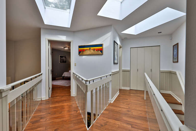 Sun-drenched loft with skylights. The open architecture keeps the whole home feeling bright and airy.