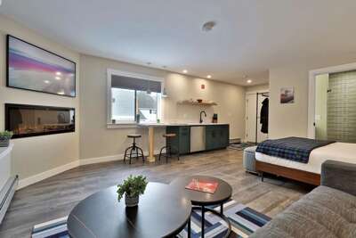 The cozy living area, built for relaxing after a day on the slopes in front of the fireplace.