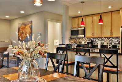 This Killington Center condo features an open-concept dining and living space, cozy and spacious for relaxing after a day on the slopes or trails.