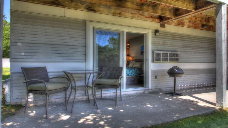 Enjoy al fresco dining on our patio, complete with a table, comfortable chairs and an electric BBQ grill (summer).