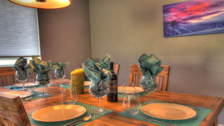 Experience a touch of rustic charm with our wooden dining room table, perfect for intimate dinners or lively gatherings.