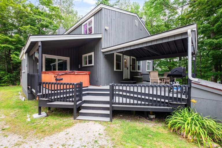 Move easily between the covered hot tub, dining deck, and grill without leaving the outdoor space.