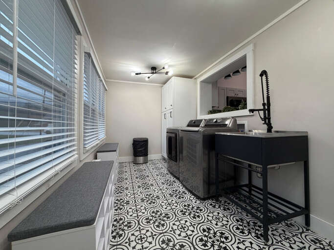 Dedicated mudroom space keeps your boots and bags organized and away from the living areas.