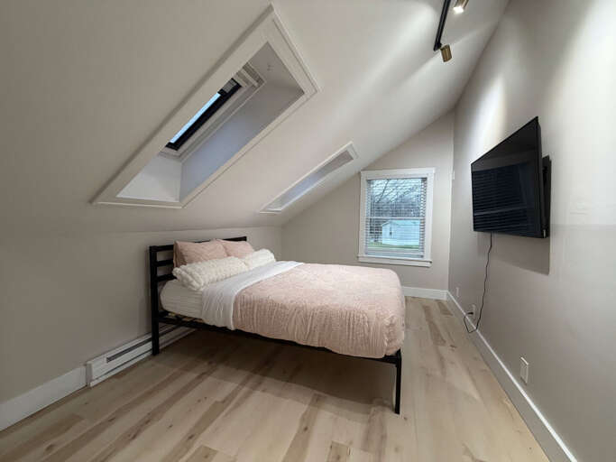 Vaulted ceilings and dual skylights provide an airy, expansive feeling while you prep for the day.