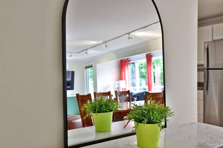 Check your reflection in the hall mirror before heading out for the evening.