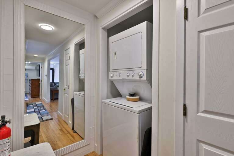 Refresh clothes between outings with the washer and dryer tucked into the condo's laundry closet.