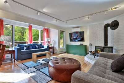 Spend the evening by the wood-burning stove, with a movie on the TV and the deck just outside.