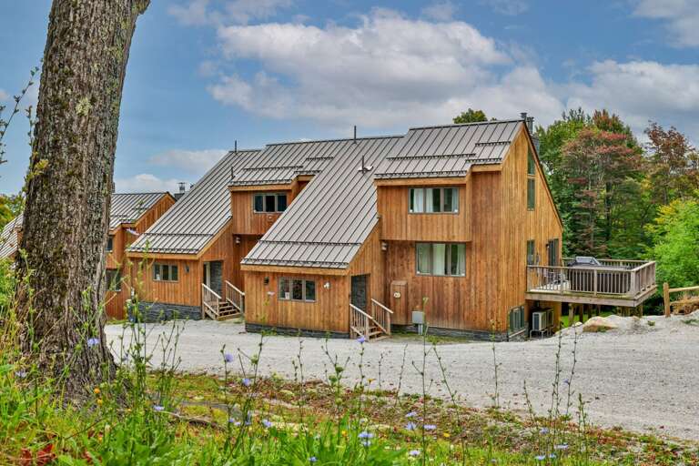 Look for the wood siding and steep metal rooflines when you arrive at the condo buildings.