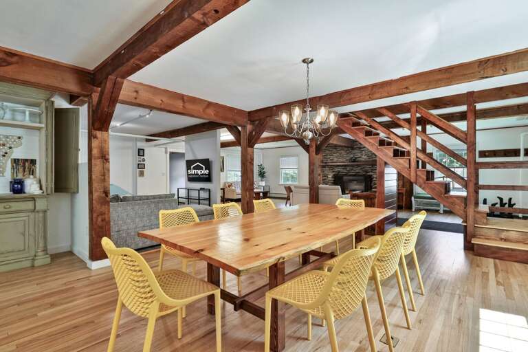 The dining room keeps everyone close to the fireplace lounge and the rest of the main floor.