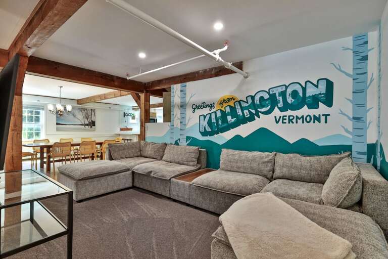 A generous sectional gives the group a comfortable place to watch a movie or catch up together.