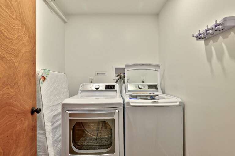 An in-home washer and dryer help guests pack lighter and handle longer stays with ease.