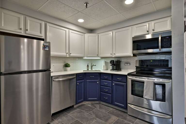 Cook at your own pace with stainless appliances and generous counters for prep and serving.