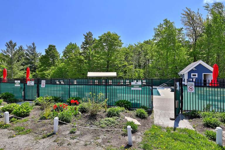 Follow the landscaped path through the gate and the pool is just ahead.