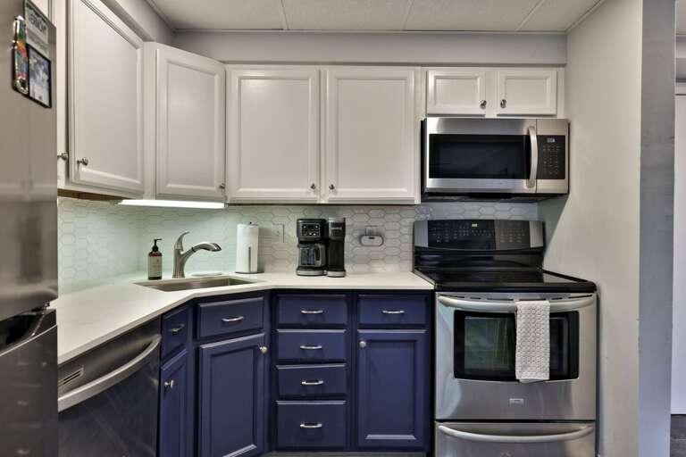 Full-size appliances are ready for early coffee, a quick lunch, or dinner at home.