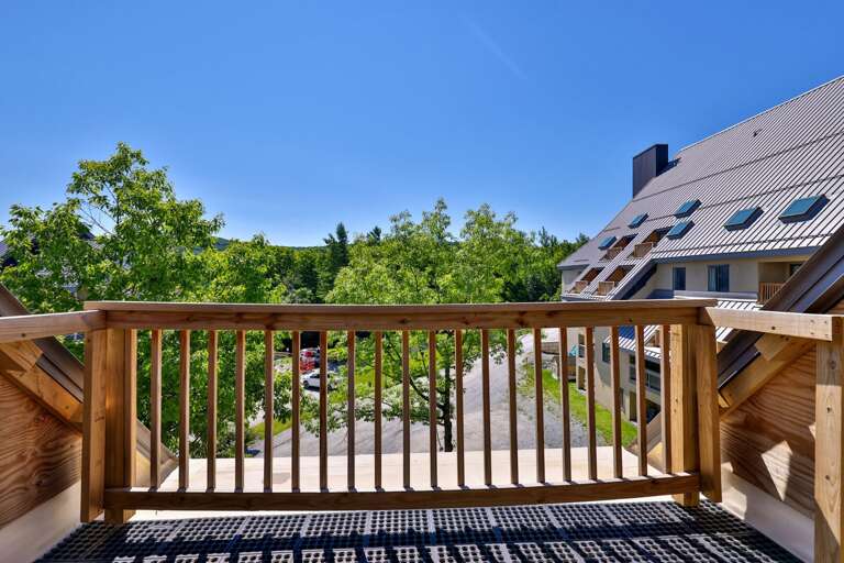 Step onto the balcony for fresh air and a clear view toward the surrounding mountains.