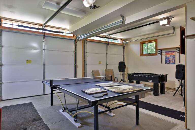 Challenge the group to a round of ping-pong in a bright game room with space for everyone to join in.