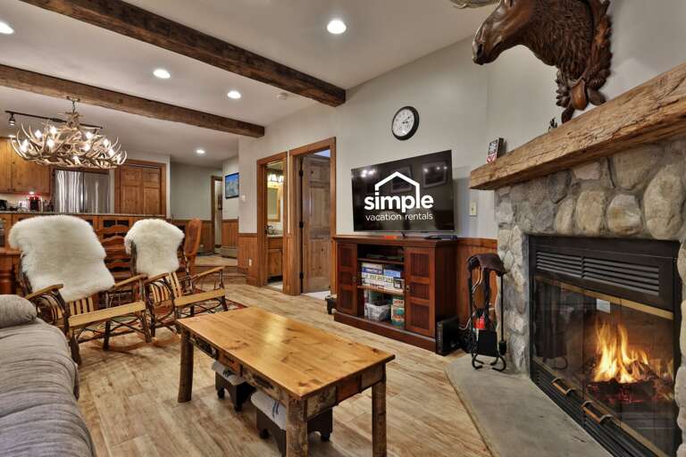 Queue up a movie while the wood-burning fireplace handles the atmosphere.